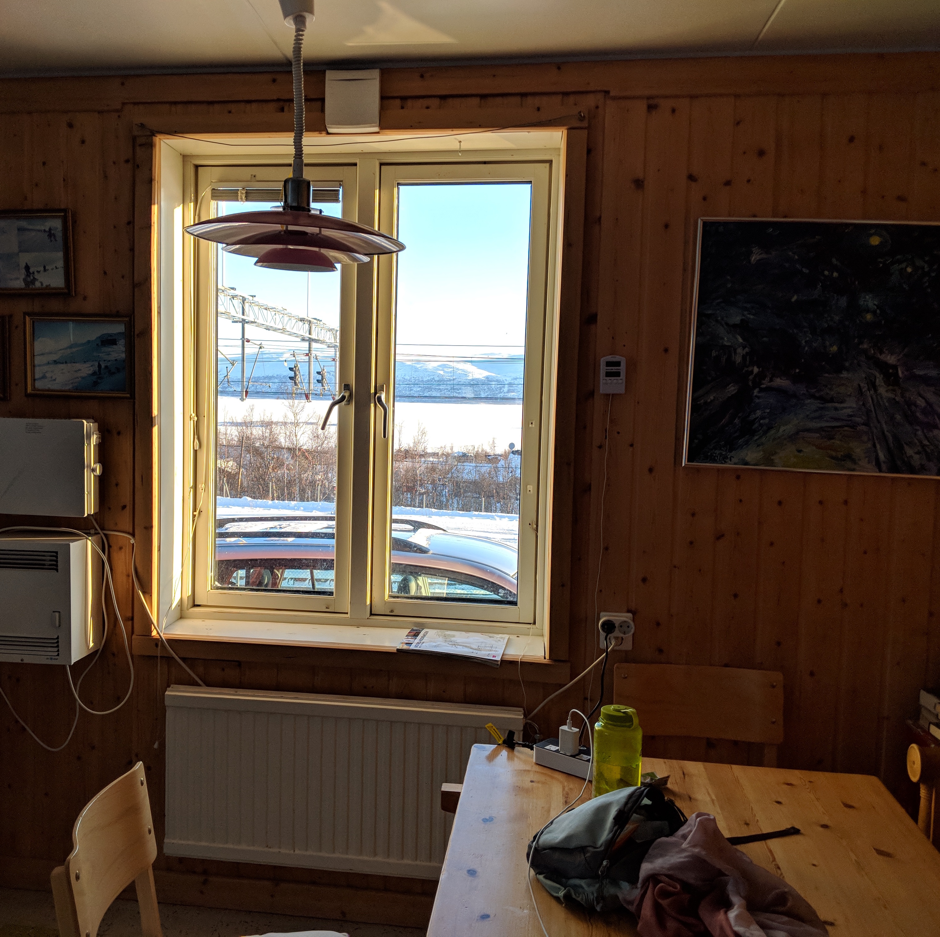 Abisko.net kitchen, looking out over the train tracks and the lake.