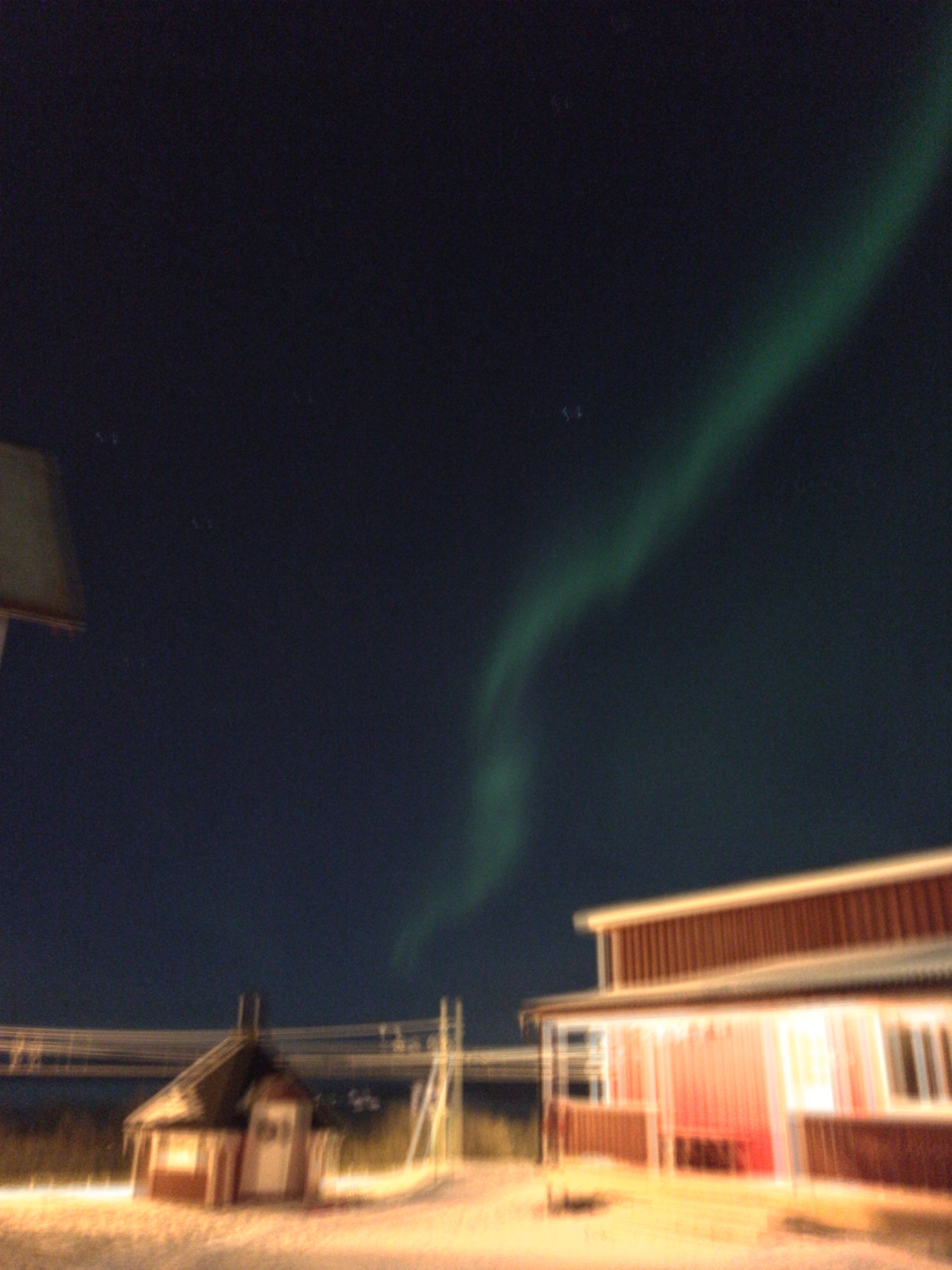 Abisko Northern Lights with our hostel in the foreground