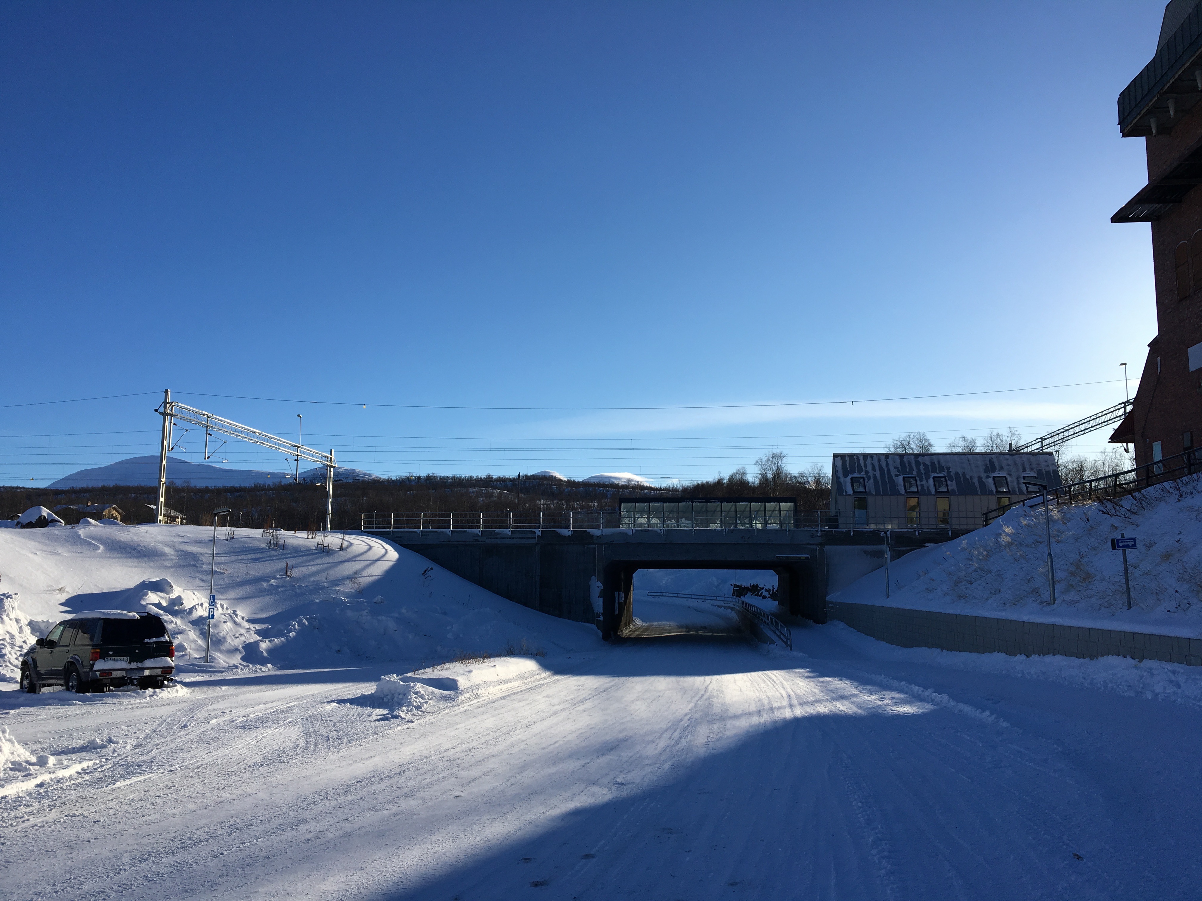 Walk under the train station and up the hill to get to Abisko.net hostel.