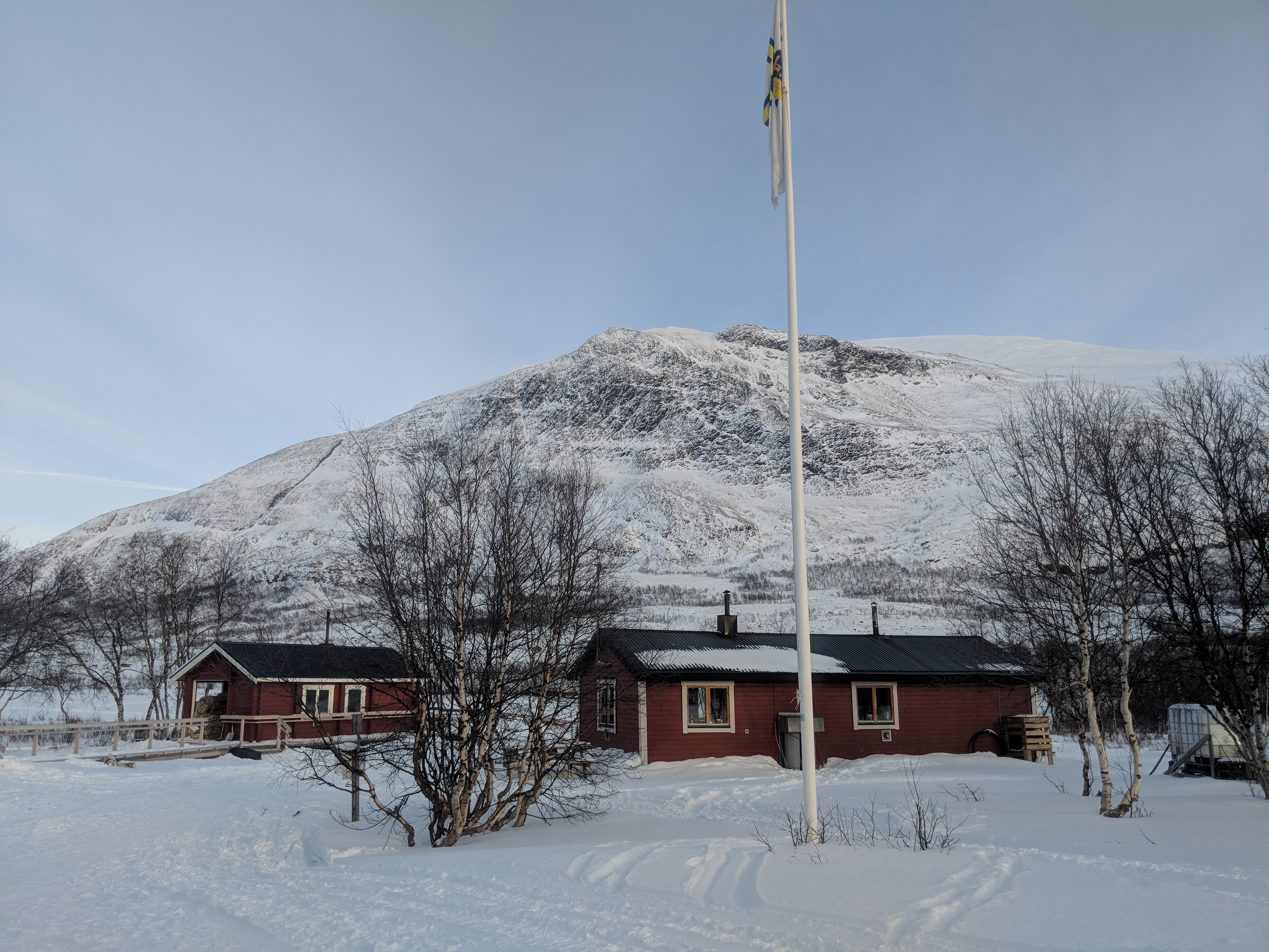 The Abiskojaure huts nestled in the mountains