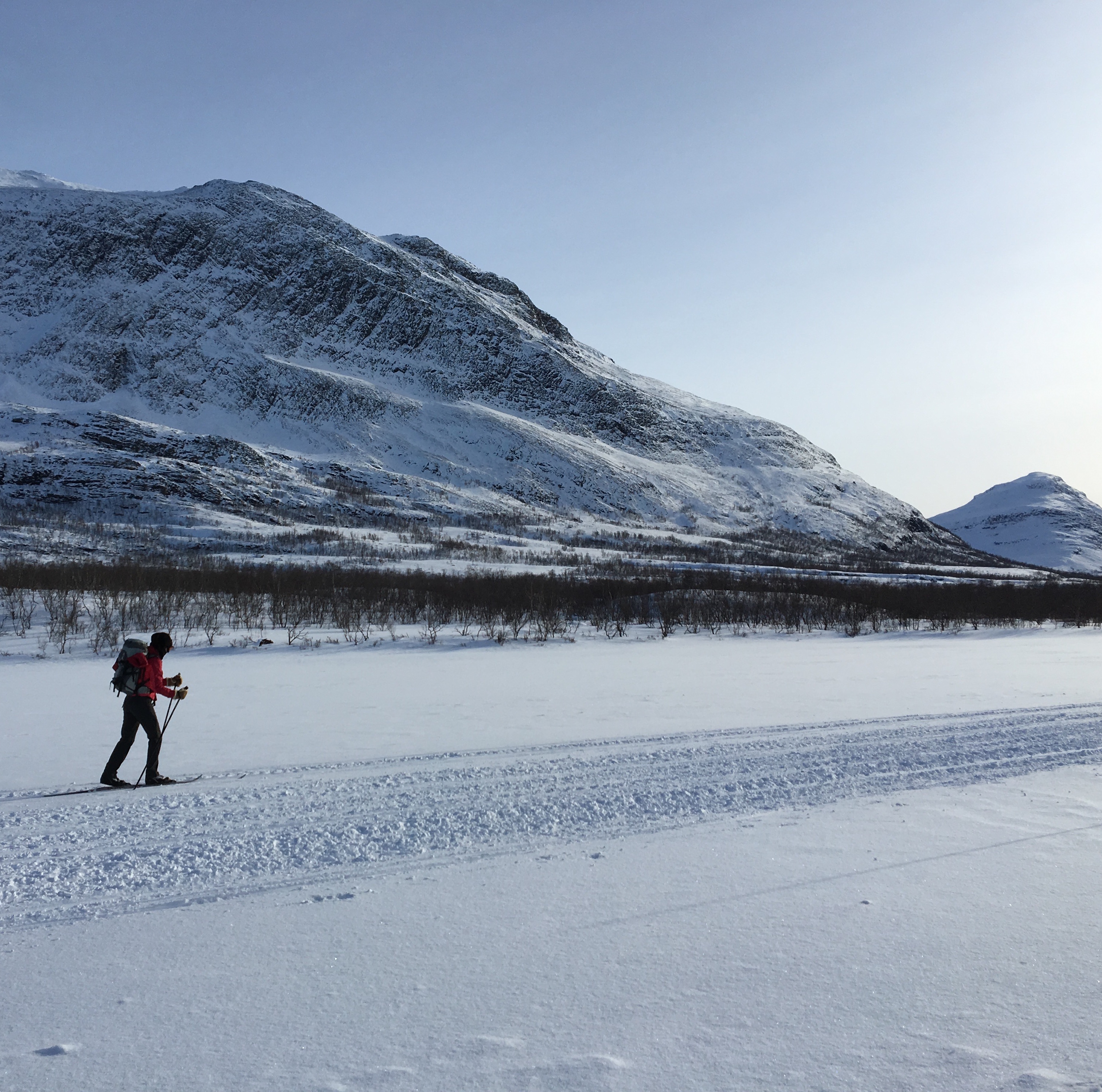 Skiing past Mount Giron